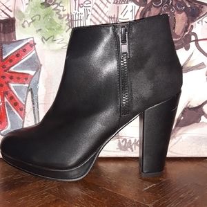 Call it Spring black booties